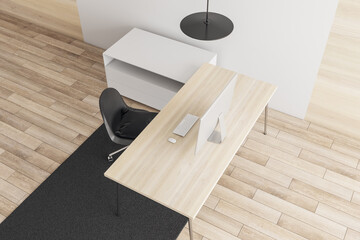 Top view of modern minimalistic wooden office interior with workplace, carpet, furniture and computer device. Style and design concept. 3D Rendering.
