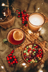 evening tea party with Christmas lights hot tea and candy