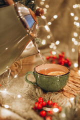 evening tea party with Christmas lights hot tea and candy