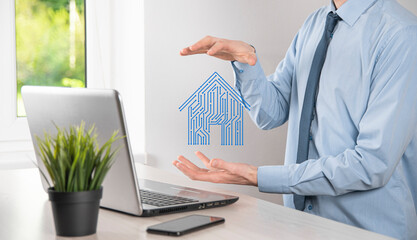 Businessman hold house icon.Smart home controlled, intelligent house, and home automation app...