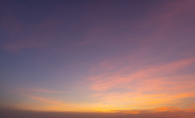 Sunset sky. Abstract nature background. Dramatic blue with orange colorful clouds in twilight time.