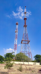 Mobile network tower with copy space blue sky background