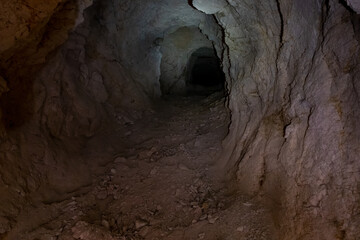 One  of the dug tunnels leading to the ruins of the palace of King Herod - Herodion in the Judean Desert, in Israel
