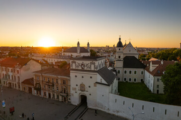 Fototapeta premium Aerial summer evening sunset view in sunny Vilnius old town, Gates of Dawn