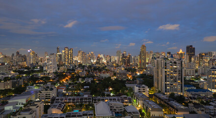 Obraz premium Aerial view of Sathorn, Bangkok Downtown. Financial district and business centers in smart urban city in Asia. Skyscraper and high-rise buildings at night.