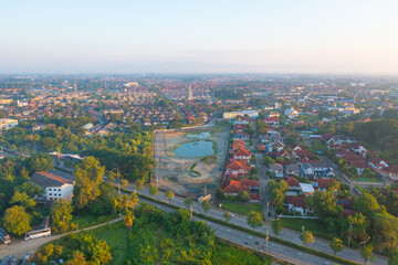 Aerial view of Chiang Mai Downtown Skyline, Thailand. Financial district and business centers in smart urban city in Asia. Skyscraper and high-rise buildings at sunset.