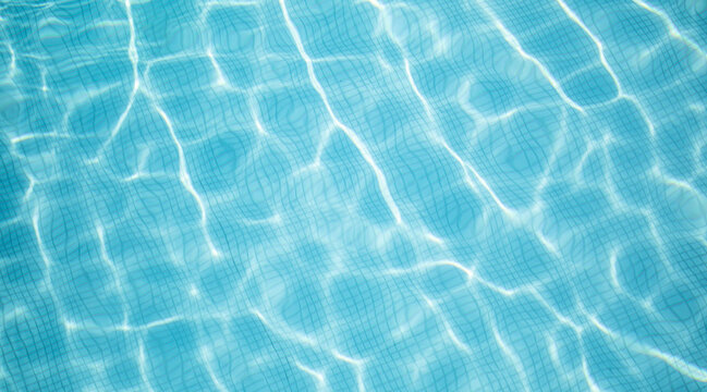 Beautiful relaxing swimming pool water sun reflection background. Ripple water texture background, natural sunlight. Abstract artistic water surface background