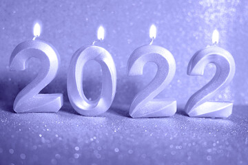 Very Peri. Color of the year 2022. Holiday background Happy New Year 2022. Numbers of year 2022...