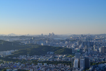 Fototapeta na wymiar Seoul city view from the top of the mountain at day time