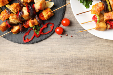 Concept of tasty food with chicken shashlik on light wooden background