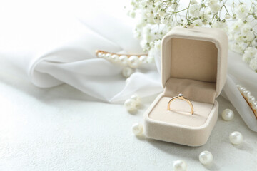 Concept of wedding accessories with wedding ring, close up - Powered by Adobe