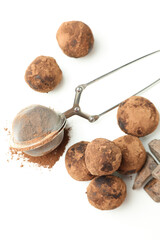 Concept of sweets with truffles on white background