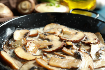 Concept of tasty food with mushroom sauce on wooden background