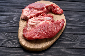 meat steak on wooden board ingredients top view food