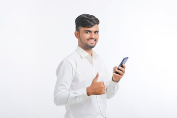young man using smartphone on white background.