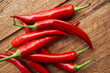 red hot chili peppers on a wooden board kitchen ingredients