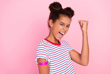 Photo of african american brown haired small childhood stylish girl wear t-shirt model winner vaccine isolated on pink color background