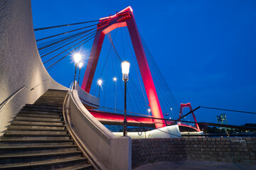 red illuminated Willems Bridge in Rotterdam