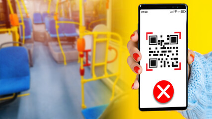 Prohibition of travel in transport without a QR code. A smartphone with an incorrect QR code in a...