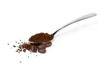 Instant coffee powder in stainless teaspoon with roasted coffe beans isolated on white background.