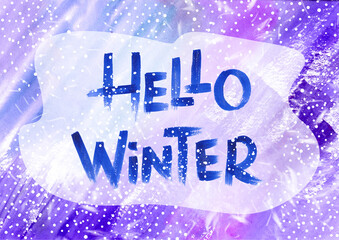 Hand drawn lettering winter phrase on white Background in frame. hello Winter - inscription calligraphy blue text with typography design on Watercolor violet and purple blot with snow on Backdrop