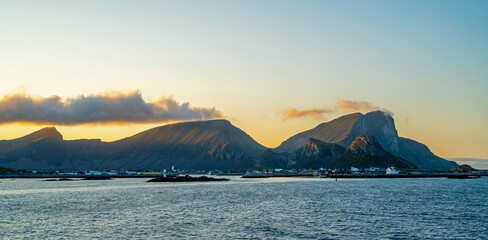 Fototapeta premium Setting sun over Vaeroy, Lofoten islands, Norway 