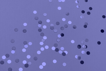 Beautiful festive peri background with confetti. Holiday decoration concept. Place for text. Concept of color of the year.