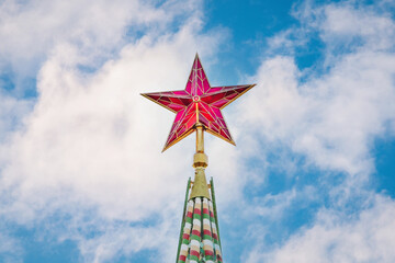 Kremlin star against blue cloudy sky on sunny day