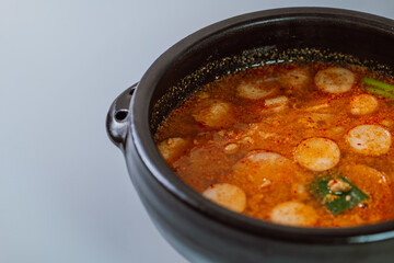 Buddaejjigae, Korean style spicy stew of wieners, luncheon meat, macaroni and vegetables.