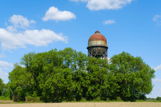 Water tower behind trees at Dortmund, North Rhine Westphalia, Germany