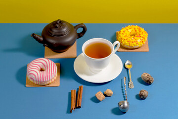 Tea with dessert on a bright colored background