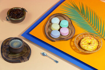 Coffee with dessert on a bright colored background 