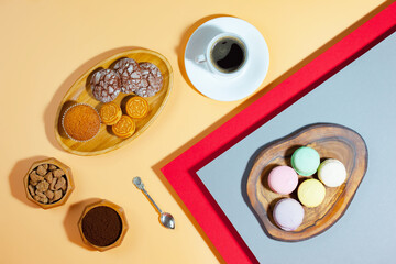 Coffee with dessert on a bright colored background 