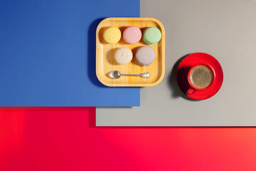 Coffee with dessert on a bright colored background 