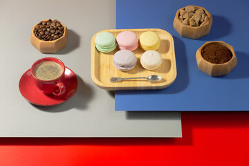 Coffee with dessert on a bright colored background 