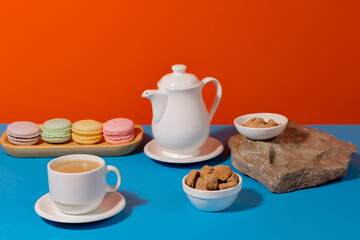 Coffee with dessert on a bright colored background 