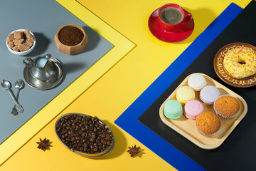 Coffee with dessert on a bright colored background 