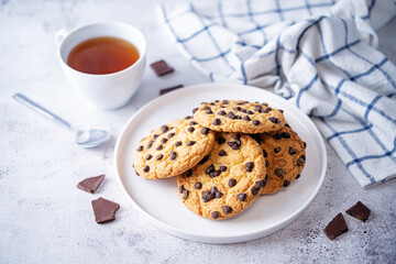Cookies with chocolate drops on a background