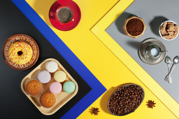Coffee with dessert on a bright colored background 