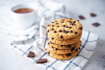 Cookies with chocolate drops on a background