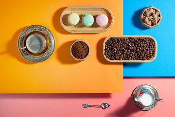 Coffee with dessert on a bright colored background 