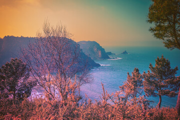View of the ocean and rocky sea coast in the evening. Asturias, Spain
