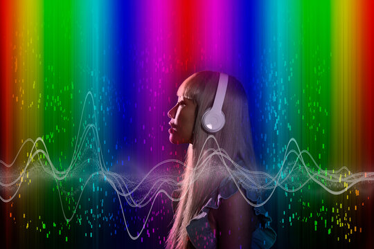 Woman listening music through headphones surrounded by wave pattern on multi-colored background