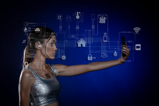 Young woman using phone with virtual icons over blue background