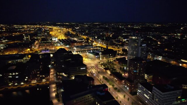 Drone flying over Malmö at night. Clarion hotel