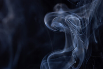 Movement of white smoke isolated on black background..