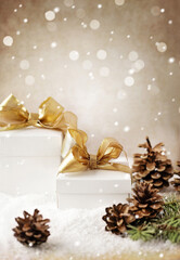 Christmas gift boxes and ornaments with snow