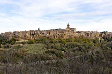 Fototapeta na wymiar Pitigliano, Tuscany, Italy. Landscape of the picturesque medieval town founded in Etruscan time on the tuff hill