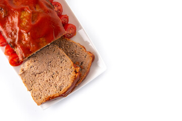 Traditional American meatloaf with ketchup isolated on white background. Top view. Copy space	
