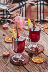 Mulled wine with cinnamon sticks and orange